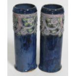 A pair of Royal Doulton stoneware vases, height 27.5cm.