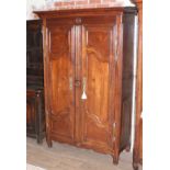 A French 18th century two door walnut armoire, width 134cm, depth 62cm & height 204cm. From the