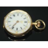A ladies pocket watch enamel dial, marked '18K', diam. 29mm, gross wt. 22.32g, with case.