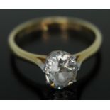 A diamond solitaire ring, the old oval/cushion cut stone weighing approx. 1.00 carats in eight