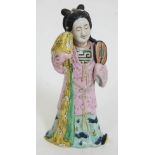 A Chinese porcelain figure, height 29.5cm.