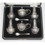 A cased hallmarked silver cruet.