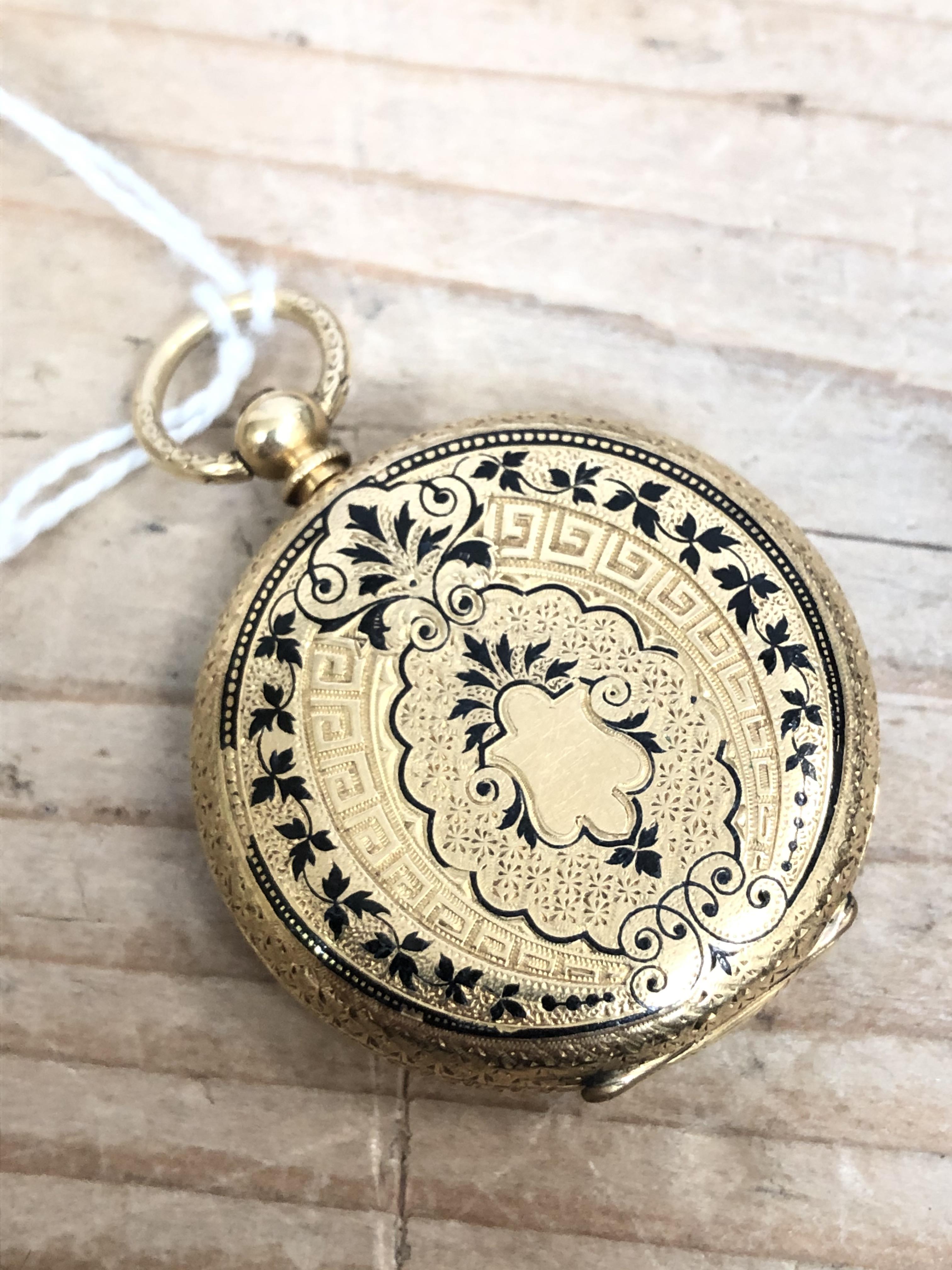 A ladies bright engraved pocket watch, marked '18K', diam. 32mm, gross wt. 26.67g. - Image 7 of 8