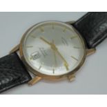 A 9ct gold Rotary Automatic wristwatch, case diam. 34mm.