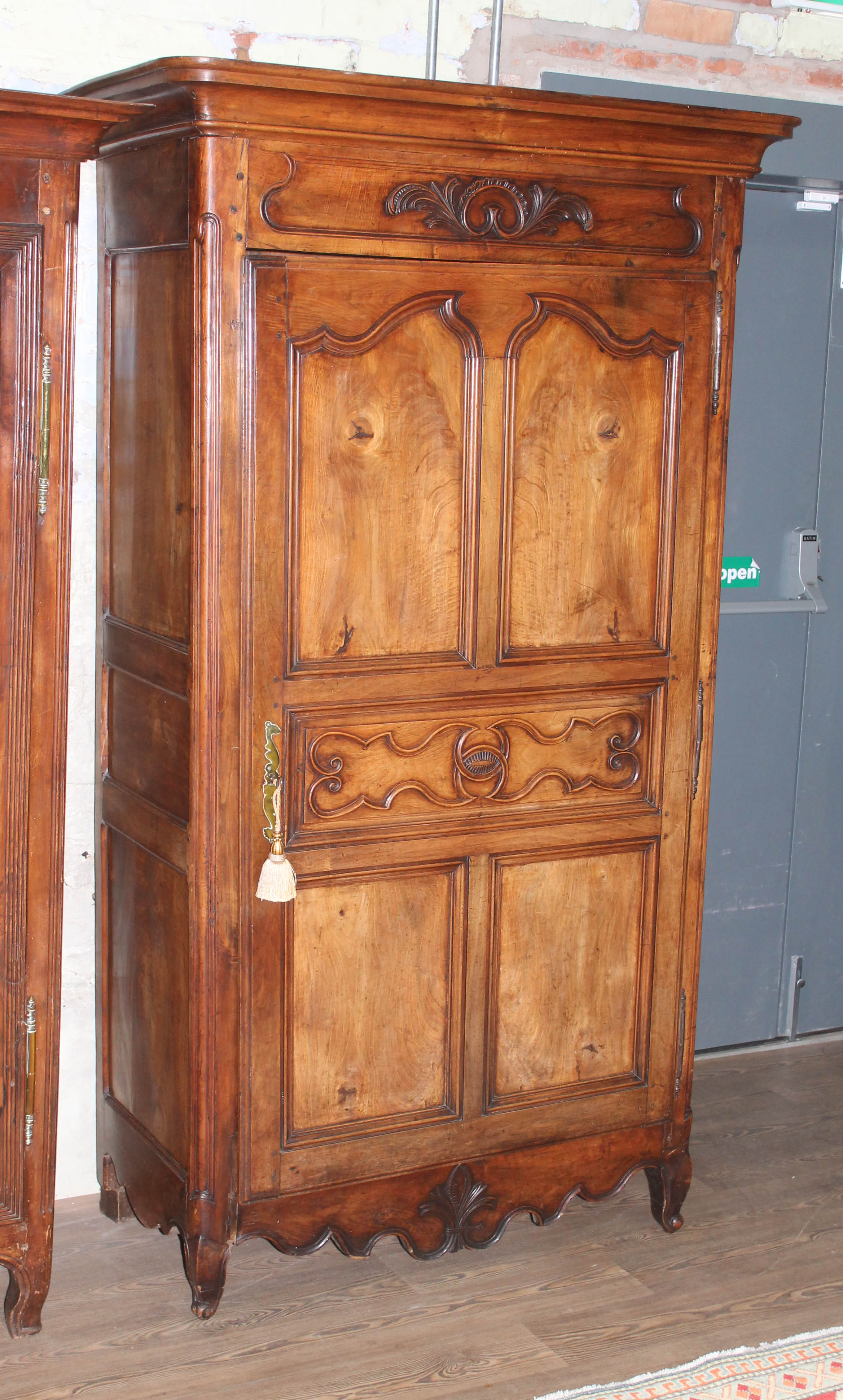 A French 18th century walnut armoire, width 119cm, depth 60cm & height 209cm. From the estate of the