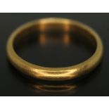 A hallmarked 22ct gold wedding band, wt. 3.86g, size P.