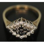 A diamond and sapphire cluster ring, hallmarked 9ct gold band, gross wt. 2.32g, size N.