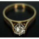 A diamond solitaire ring, the stone weighing approx. 0.50 carats, band hallmarked 18ct gold, gross