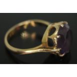 An amethyst ring, the stone diam. 12mm and depth 6mm, band unmarked, gross wt. 5g, size N.