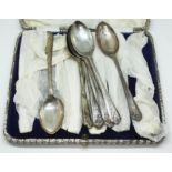 A cased set of six hallmarked silver spoons and five others.