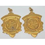 Two hallmarked 9ct gold medals, wt. 15.73g.