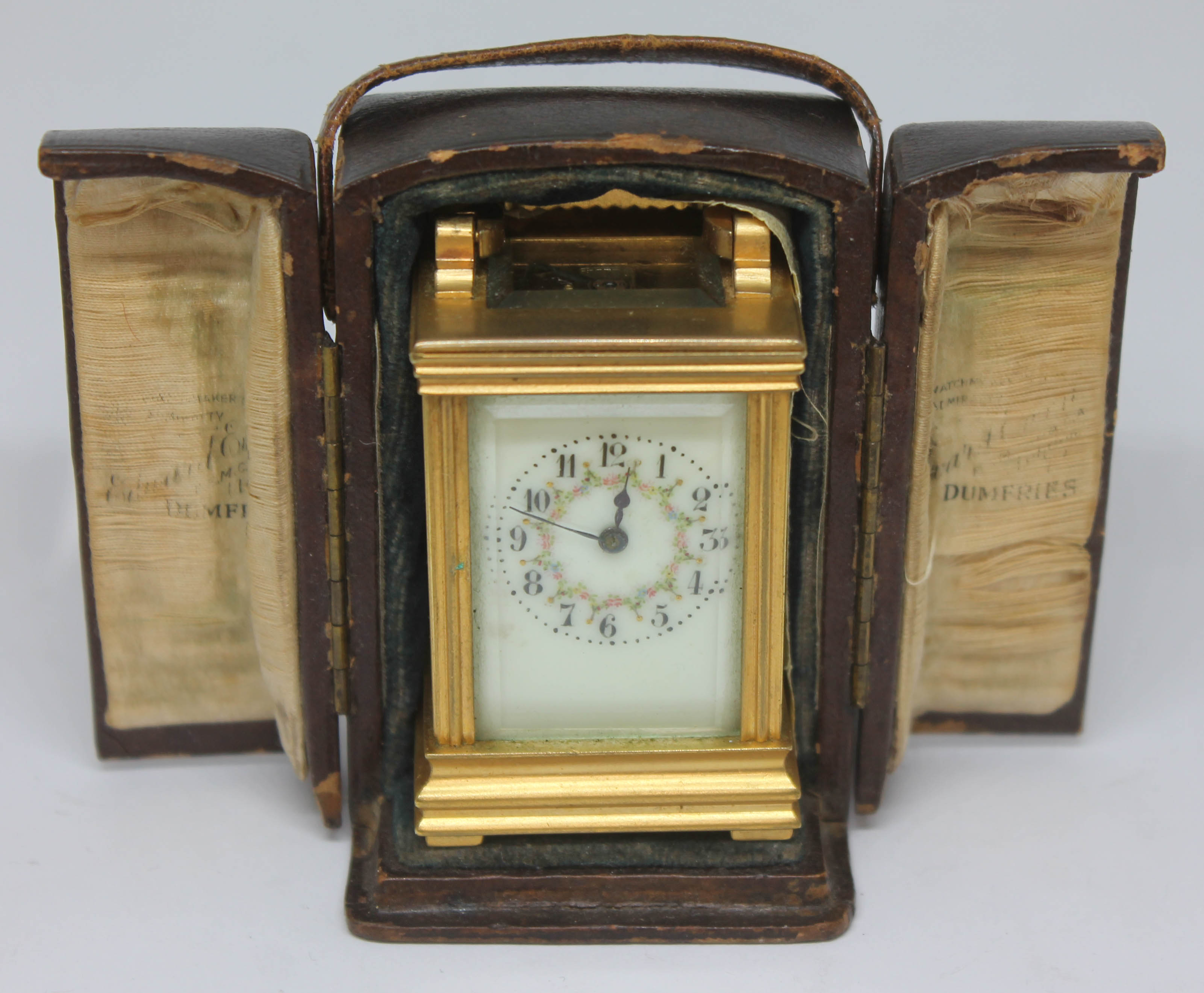 A French miniature carriage clock, height 7.5cm, with case.