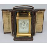 A French miniature carriage clock, height 7.5cm, with case.
