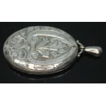 A hallmarked silver pendant locket, length 68mm.