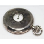 A hallmarked silver half hunter pocket watch, diam. 46mm.