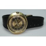 A vintage gold plated Omega Geneve Dynamic automatic wristwatch, with two tone gold and brown dial,