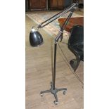 A Herbert & Terry & Sons 1209 medical angle-poise lamp.