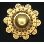 A Victorian revivalist target brooch, unmarked, gross wt. 13.74g, diam. 38mm.