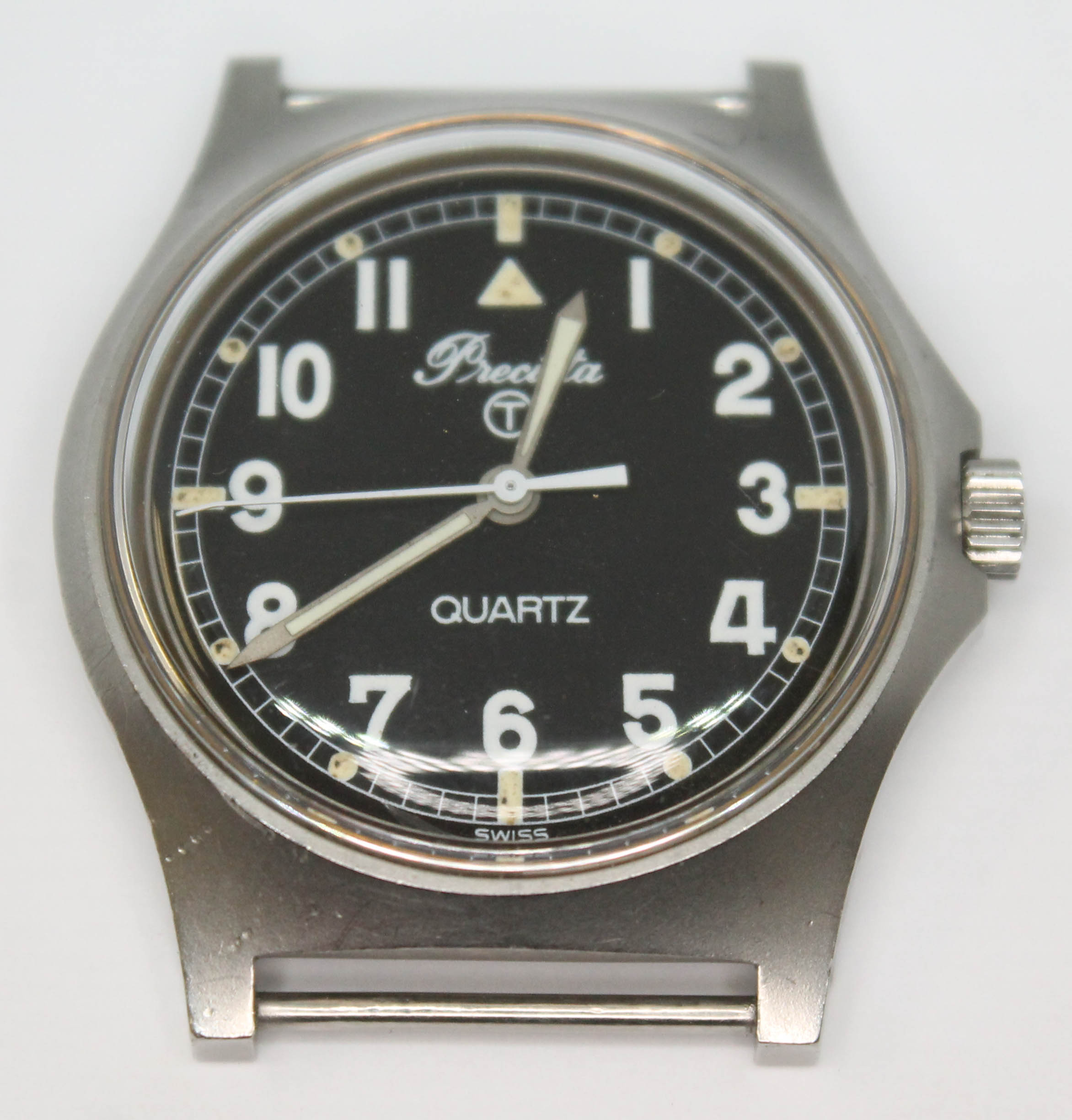 A 1980 Precista UK military stainless steel quartz wristwatch having signed black dial Arabic