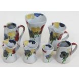 Janice Tchalenko "Poppy" for Dartington Pottery, a group of seven pieces comprising five jugs and