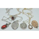 A mixed lot comprising a modern Art Nouveau style pendant set with an amber cabochon on chain both