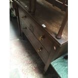 An oak two drawer chest with brass handles Catalogue only, live bidding available via our website.