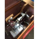 Essex miniature sewing machine in case. Catalogue only, live bidding available via our website.