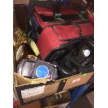 A box containing Chinon camera, lenses, PSP, Murphy radio, mobile phones, VR headset, carriage clock