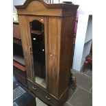 An Edwardian inlaid and cross banded mirror door wardrobe Catalogue only, live bidding available via