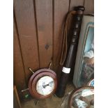A circular barometer in shape of ship's wheel and a vintage Hiatt & Co police trunkeon. Catalogue