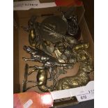 A box of brass and white metal animal figures including pheasants, camels, dogs etc Catalogue