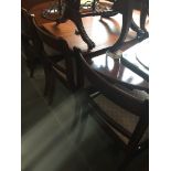A reproduction mahogany extending dining table with 6 chairs Catalogue only, live bidding
