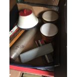 A box of vintage musical instruments including harmonicas, Scandinavian flute, tom-toms etc
