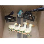 A box with two vintage press', a cast metal duck door stop, etc Catalogue only, live bidding