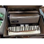 A vintage cased Bellini piano accordian Catalogue only, live bidding available via our website. If