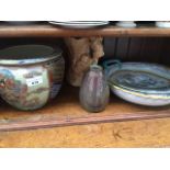 Four pieces of pottery and a glass bowl Catalogue only, live bidding available via our website.
