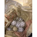 A Dunlop bag containing practice golf balls. Catalogue only, live bidding available via our website.
