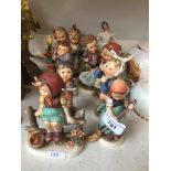 Eight Hummel figures and a ballerina Catalogue only, live bidding available via our website.