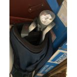 A junior golf bag with clubs. Catalogue only, live bidding available via our website. Please note if