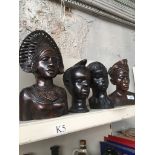 Four carved heads. Catalogue only, live bidding available via our website. Please note if you