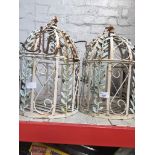 A pair of metal hanging planters in shape of birds cages Catalogue only, live bidding available
