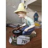 Royal Doulton figure River Boy Catalogue only, live bidding available via our website. Please note