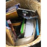 A wicker baskets with various items inc CDs, etc Catalogue only, live bidding available via our