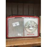 A Dansette radio with original tag Catalogue only, live bidding available via our website. Please