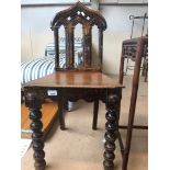 An ecclesiastical hall chair Catalogue only, live bidding available via our website. Please note