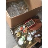 A mixed box including figurines, brassware and tins etc Catalogue only, live bidding available via