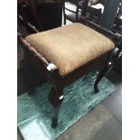 A piano stool Catalogue only, live bidding available via our website. Please note if you require P&P