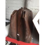 A vintage leather bag Catalogue only, live bidding available via our website. Please note if you
