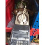 Two vintage telephones and a vintage Adler 816 AD calculator. Catalogue only, live bidding available