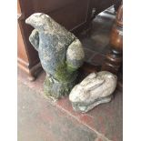 Two concrete garden ornaments - an eagle and a bunny. Catalogue only, live bidding available via our